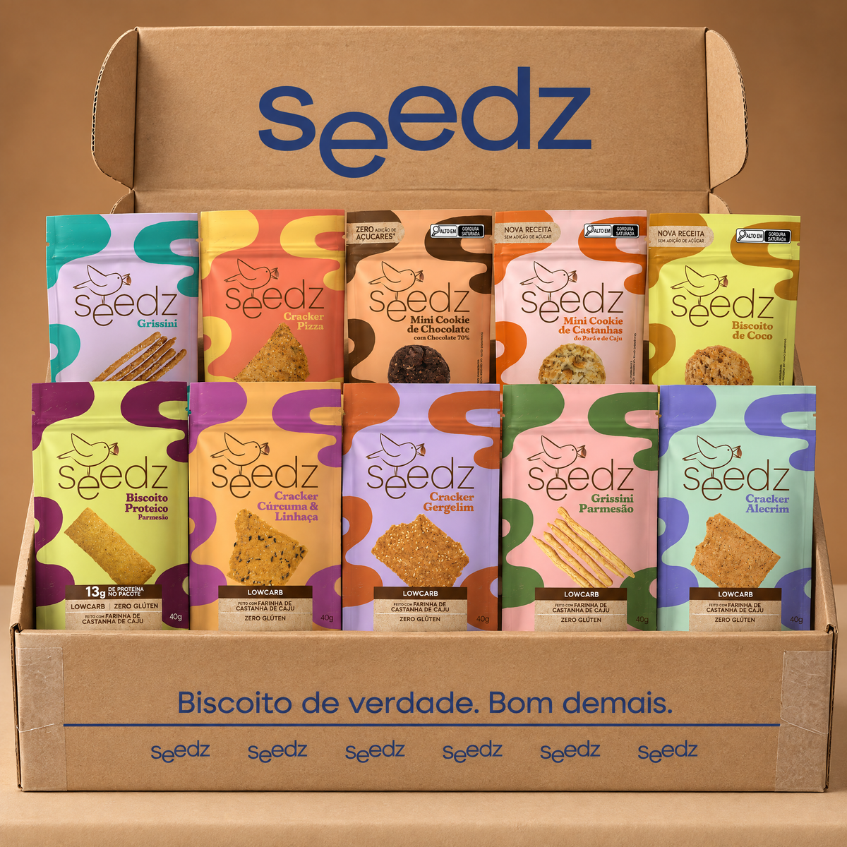 Caixa Mista seedz aberta com os 10 sabores, um pacote de cada: 7 salgados e 3 doces