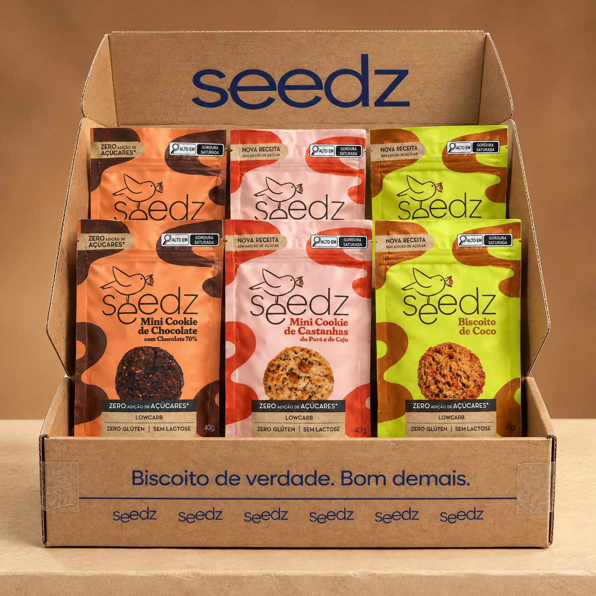 Caixa Biscoitos Doces seedz aberta, com os 3 sabores doces sem acucar adicionado